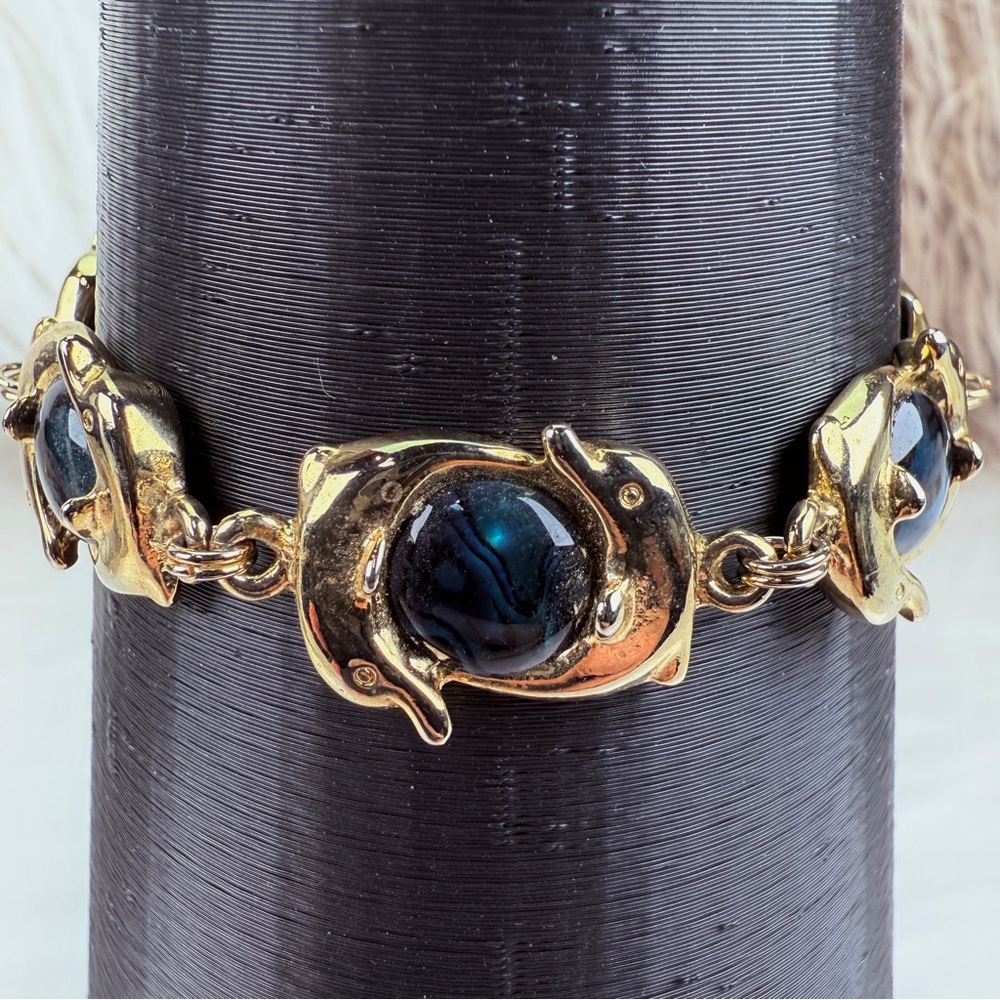 Pretty goldtone, dolphin, dancing costume bracelet - Picture 10 of 10